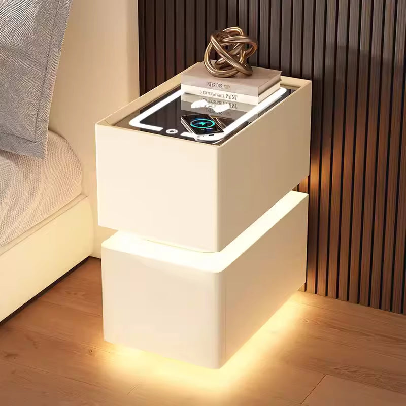 Elevate your bedroom with our Creative Intelligent Bedside Table! Featuring wireless charging, modern storage, and a sensor light, this stylish nightstand is a perfect blend of innovation and elegance.