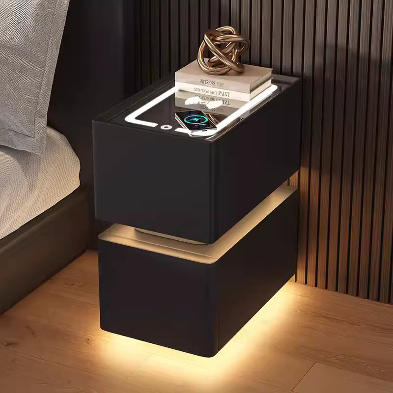 Elevate your bedroom with our Creative Intelligent Bedside Table! Featuring wireless charging, modern storage, and a sensor light, this stylish nightstand is a perfect blend of innovation and elegance.