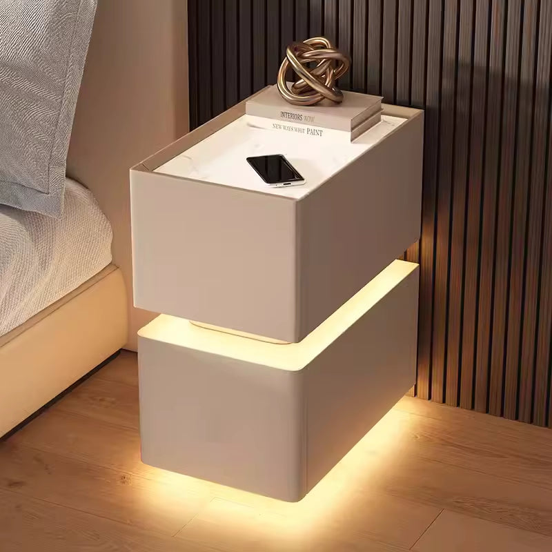 Elevate your bedroom with our Creative Intelligent Bedside Table! Featuring wireless charging, modern storage, and a sensor light, this stylish nightstand is a perfect blend of innovation and elegance.