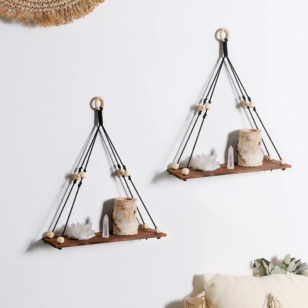 Enhance your home with our 2Pcs Wooden Wall Shelf Set! Featuring a charming macrame design and wood beads, these floating shelves add a stunning Nordic touch. Perfect for displaying plants, photos, and decor in a stylish boho aesthetic!