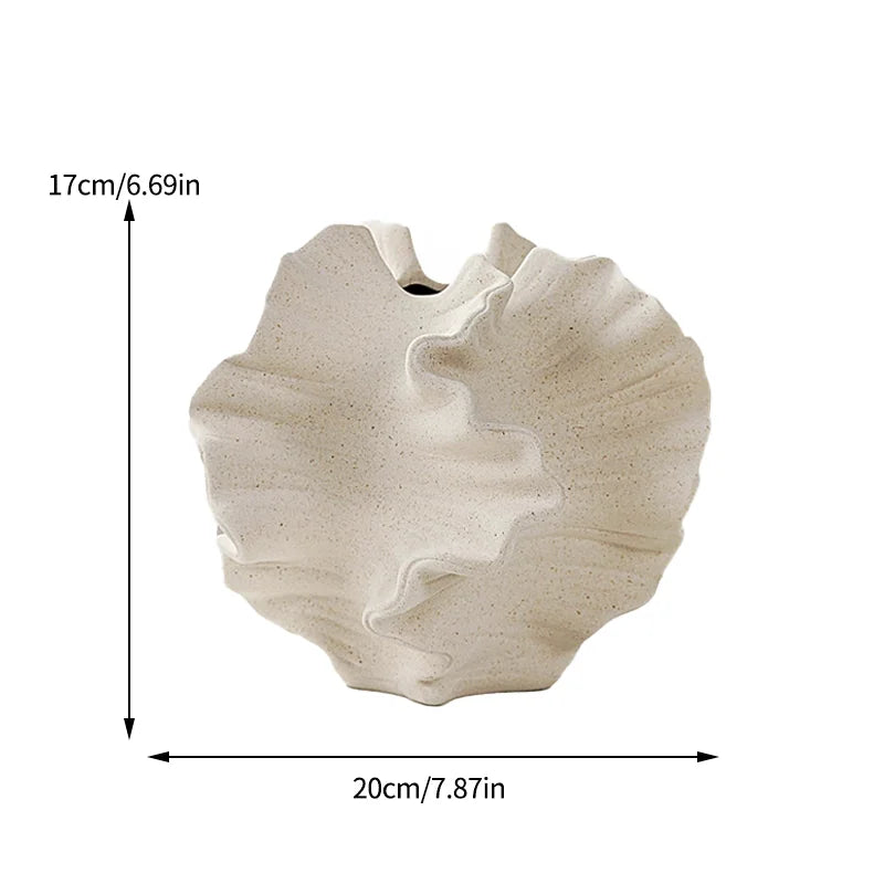 Elegant Minimalist Mirage Vase: A ceramic coral vase inspired by Nordic art, perfect for adding a touch of modern charm to your beige living room. Ideal center decoration!