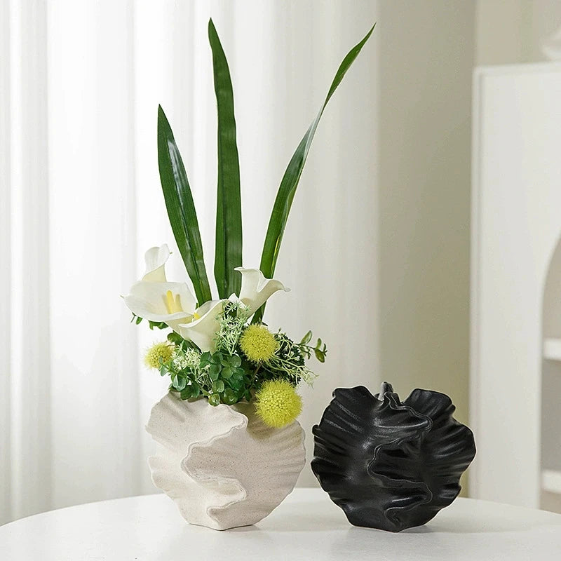 Elegant Minimalist Mirage Vase: A ceramic coral vase inspired by Nordic art, perfect for adding a touch of modern charm to your beige living room. Ideal center decoration!