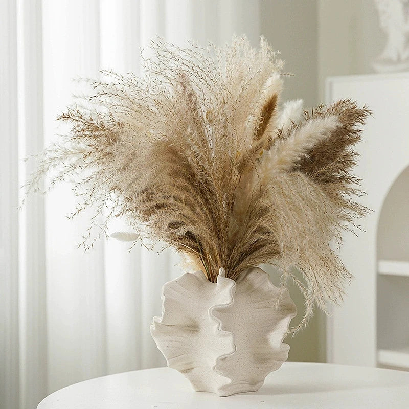 Elegant Minimalist Mirage Vase: A ceramic coral vase inspired by Nordic art, perfect for adding a touch of modern charm to your beige living room. Ideal center decoration!