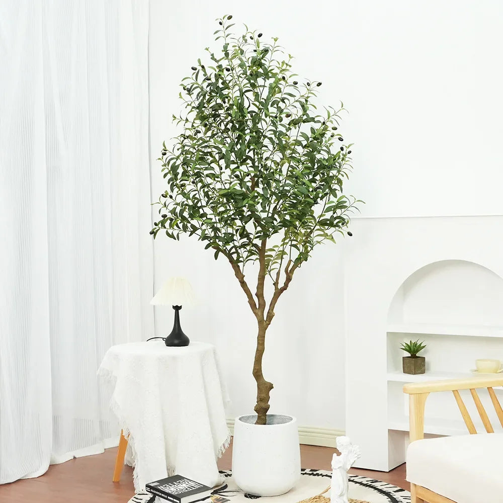 Trendy large artificial olive tree, perfect for home and garden decor. This faux green potted plant complements Nordic-style interiors, adding a touch of elegance and freshness to any space!