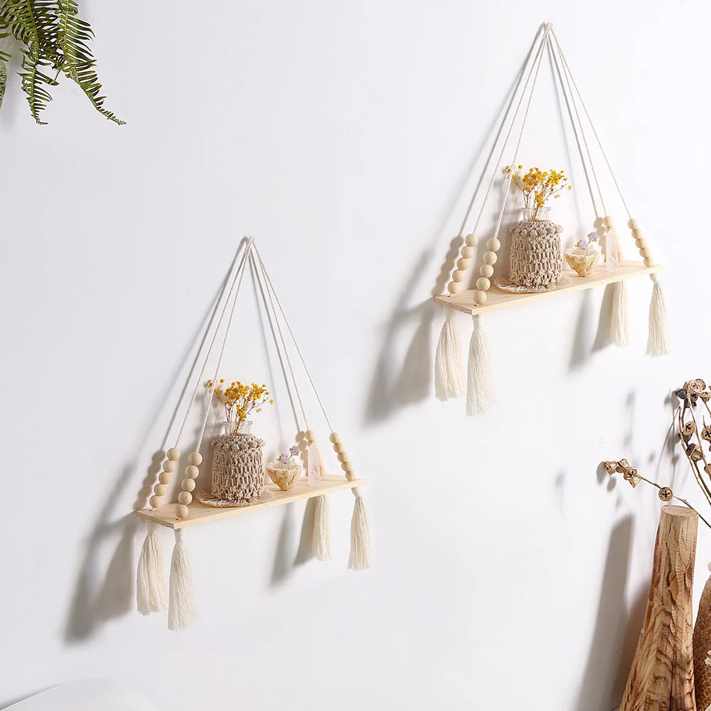 Enhance your home with our 2Pcs Wooden Wall Shelf Set! Featuring a charming macrame design and wood beads, these floating shelves add a stunning Nordic touch. Perfect for displaying plants, photos, and decor in a stylish boho aesthetic!
