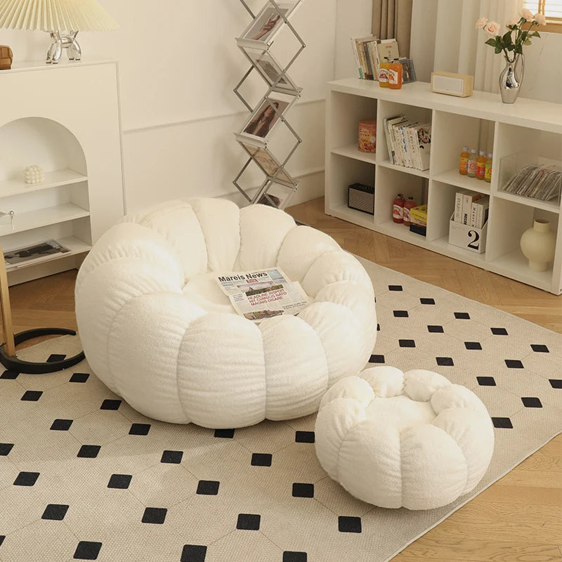 Relax in style with our modern lazy sofa chair! Perfect for balcony or living room, this small sofa with stool offers comfort and elegance for your bedroom or leisure space.