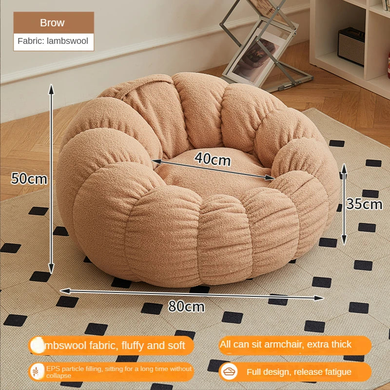 Relax in style with our modern lazy sofa chair! Perfect for balcony or living room, this small sofa with stool offers comfort and elegance for your bedroom or leisure space.