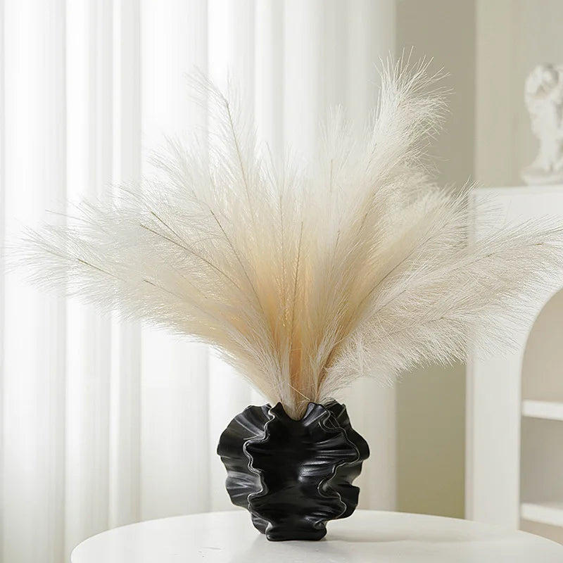 Elegant Minimalist Mirage Vase: A ceramic coral vase inspired by Nordic art, perfect for adding a touch of modern charm to your beige living room. Ideal center decoration!